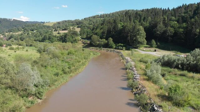 Flying over Poprad river near Piwninczna-Zdroj and Mnisek nad Popradom