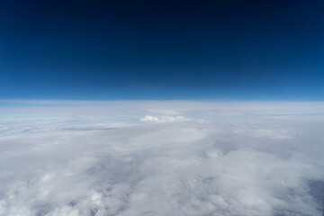  Landscape over the clouds from airplane