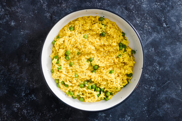 plant-based food, vegan turmeric ginger risotto with peas