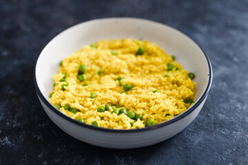 plant-based food, vegan turmeric ginger risotto with peas