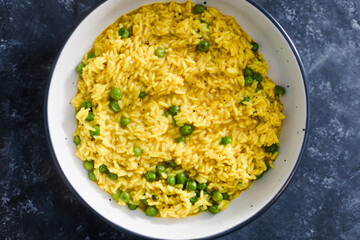 plant-based food, vegan turmeric ginger risotto with peas