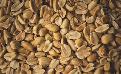 Macro close up portrait of organic peeled peanuts , studio lighting, selective focus