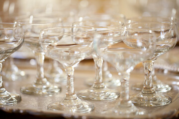 Saucer Empty Champagne Glasses on a Silver Tray