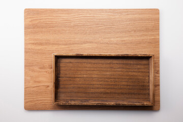 A square wood tray isolated white, top view at the studio.