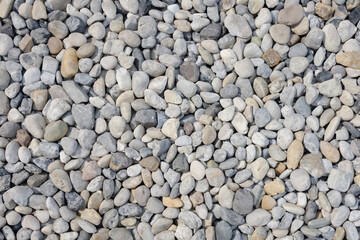 Pebble stone background, small Screen in garden with difference color, abstract background.