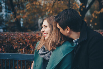 Fototapeta premium Valentine's day: a couple in love on a Park bench