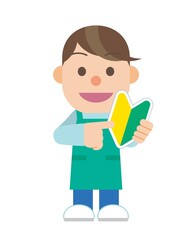 初心者マークを持ったエプロン姿の男性