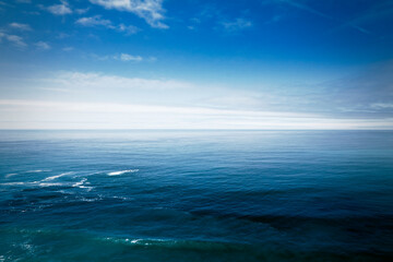 Blue Ocean Waves Background With Few Clouds Nn The Sky. California Coast. Blue Sky Color