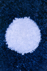 Detailed macro photo of Frozen bubbles on ice of deep lake in winter. Nature background.