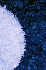 Detailed macro photo of Frozen bubbles on ice of deep lake in winter. Nature background.