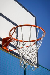 Basketball board with basket hoop on playground. Sport, recreation and healthy lifestyles on fresh air