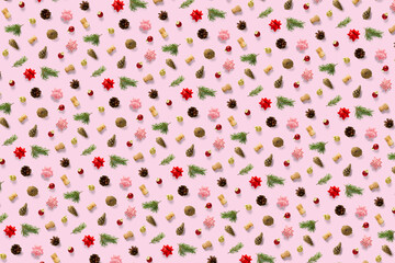 modern christmas background on pink backdrop. creative flat lay for christmas time, banners, posters, prints and other creative works.