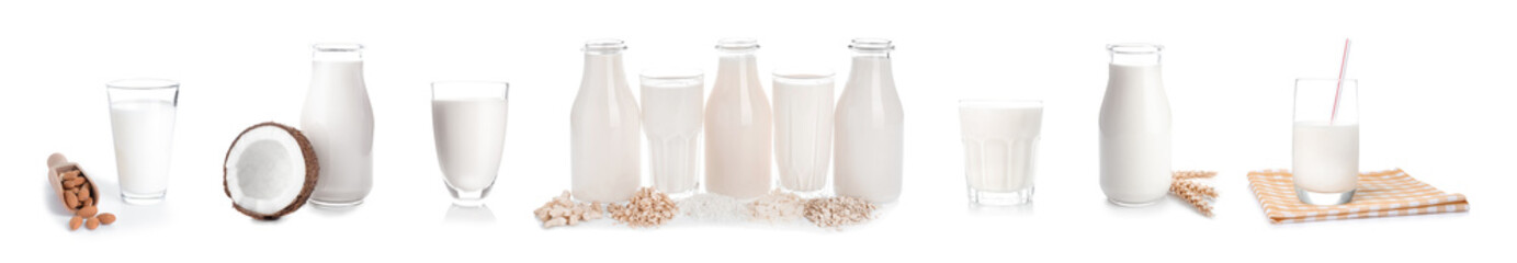 Glassware of different vegan milk on white background