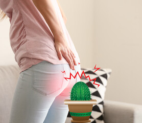 Young woman with hemorrhoids at home