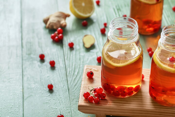 Bottles of fresh ice tea on table