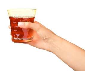 Hand with glass of fresh juice on white background