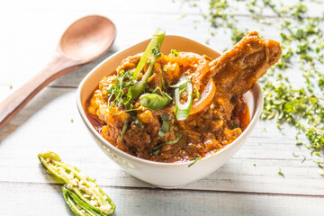 chicken kasha is a very popular Bengali dish. It is cooked in onion, ginger-garlic, and masala based gravy. The dish is semi-dry.