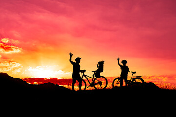 Fototapeta na wymiar father riding a bike with family members
