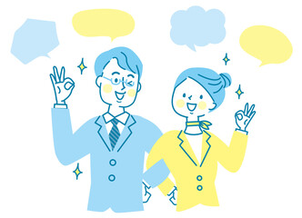 腕を組んでOKサインするスーツ姿の若い男女