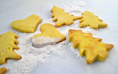 New Year's cookies of different shapes and decorations for the Christmas tree.