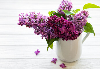 Spring bouquet. Luilac flowers in a vase
