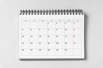 Calendar on gray background.  グレー背景の上に置かれたカレンダー