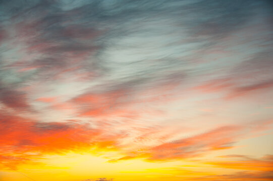 Morning sky with amazing sunrise colorful cloud background, fantastic fature and dramatic bright sunlight beautiful color. Concepts: idyllic peaceful