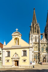 Obraz premium View at the Church of St.Johann with Cathedral tower in Regensburg - Germany