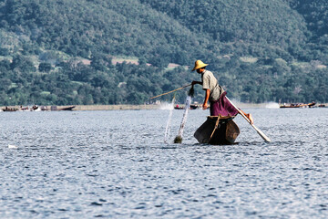 Naklejka premium Traditional one Leg Fisher on Inle Lake in Mayanmar, former Burma