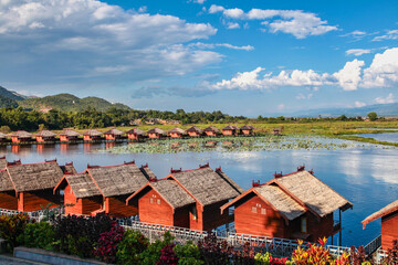 Fototapeta na wymiar Wooden floating houses on Inle Lake in Shan, Myanmar, former Burma