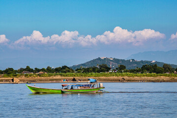 Fototapeta premium Boat trip on the Irrawaddy river in Mandalay, Myanmar former Burma