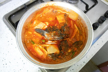 Delicious Spicy Fish Stew in a hot pot. Spicy Seafood Stew.