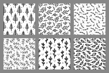 Set of hand drawn seamless floral backgrounds. Endless patterns. Black and white. Great for paper, card, wallpaper, banner, fabric, interior. Vector illustration.