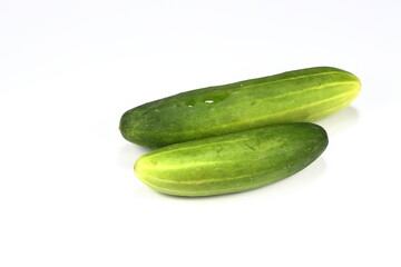 Fresh and organic cucumber isolated on the white background. Famous side dish vegetable ingredients for food decoration. 