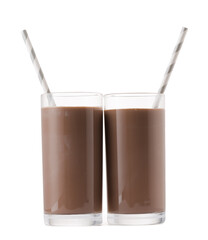 Glass cup of chocolate milk with a straw isolated on white