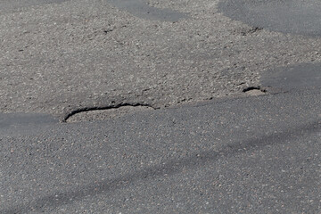 asphalt damaged road