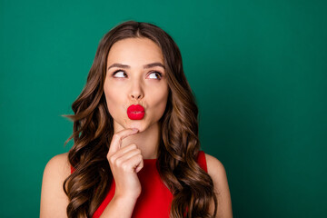 Close-up portrait of her she nice-looking attractive lovable lovely sweet winsome curious minded wavy-haired girl pout lips overthinking ponder copy space isolated over green color background