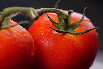 Close-up of red tomato with water drop