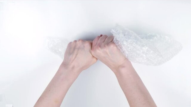 Air pockets intense bursting, bubble wrap package.