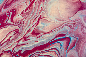 Modern fluid art. Abstract colorful background with swirl of acrylic pouring paints