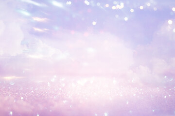 glitter vintage lights background. silver, gold and white. de-focused