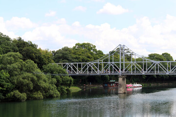 Bridge connecting Okayama Korakuen Garden and its reflection