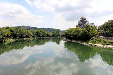Fototapeta na wymiar Lake reflection of Okayama-jo or Okayama Castle