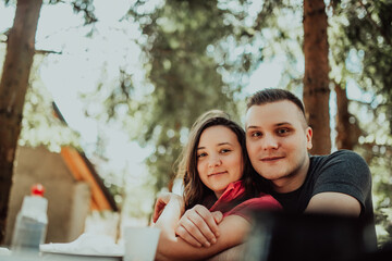 Fototapeta premium the young couple spend time together in the forest