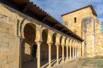 Side view of the Mozarabic monastery of San Miguel de Escalada, in Leon, Spain. The columns of the entry are seen first