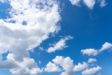 In the middle of the day, the white clouds are in great contrast with the blue sky