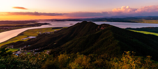 Beautiful evening view of the hilly and rural landscape of Gimpo, Korea as seen from Munsunsan Mountain. 