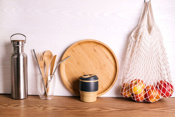 Eco set with bamboo cutlery, plate, coffee mug, water bottle and eco bag.