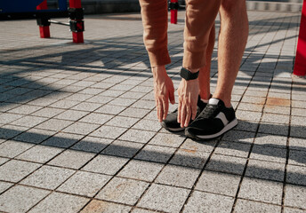 Naklejka premium A man doing stretching exercises