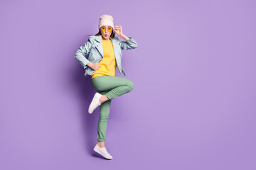Full length photo of astonished girl jump impressed unbelievable unexpected discount wear good look...